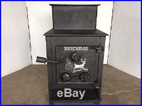 It says <strong>huntsman</strong> on the door and has three knobs for controling the draft, along with a picture of a deer jumping over a log. . Huntsman wood stove